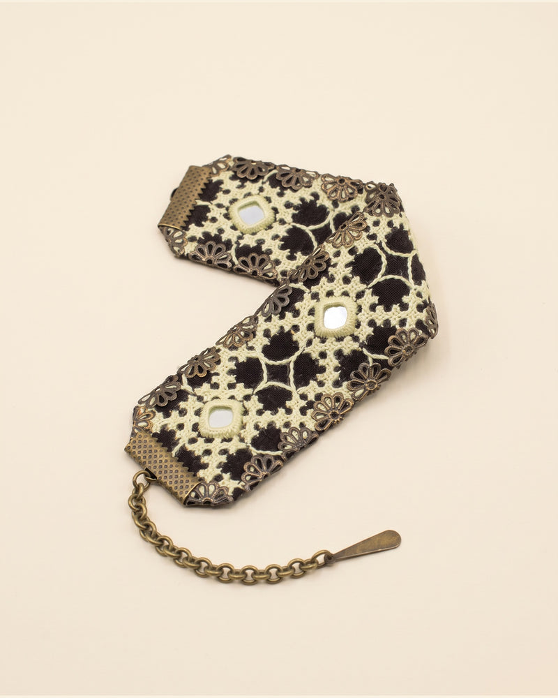 Handmade Balochi embroidered bracelet, cream, gold — packshot