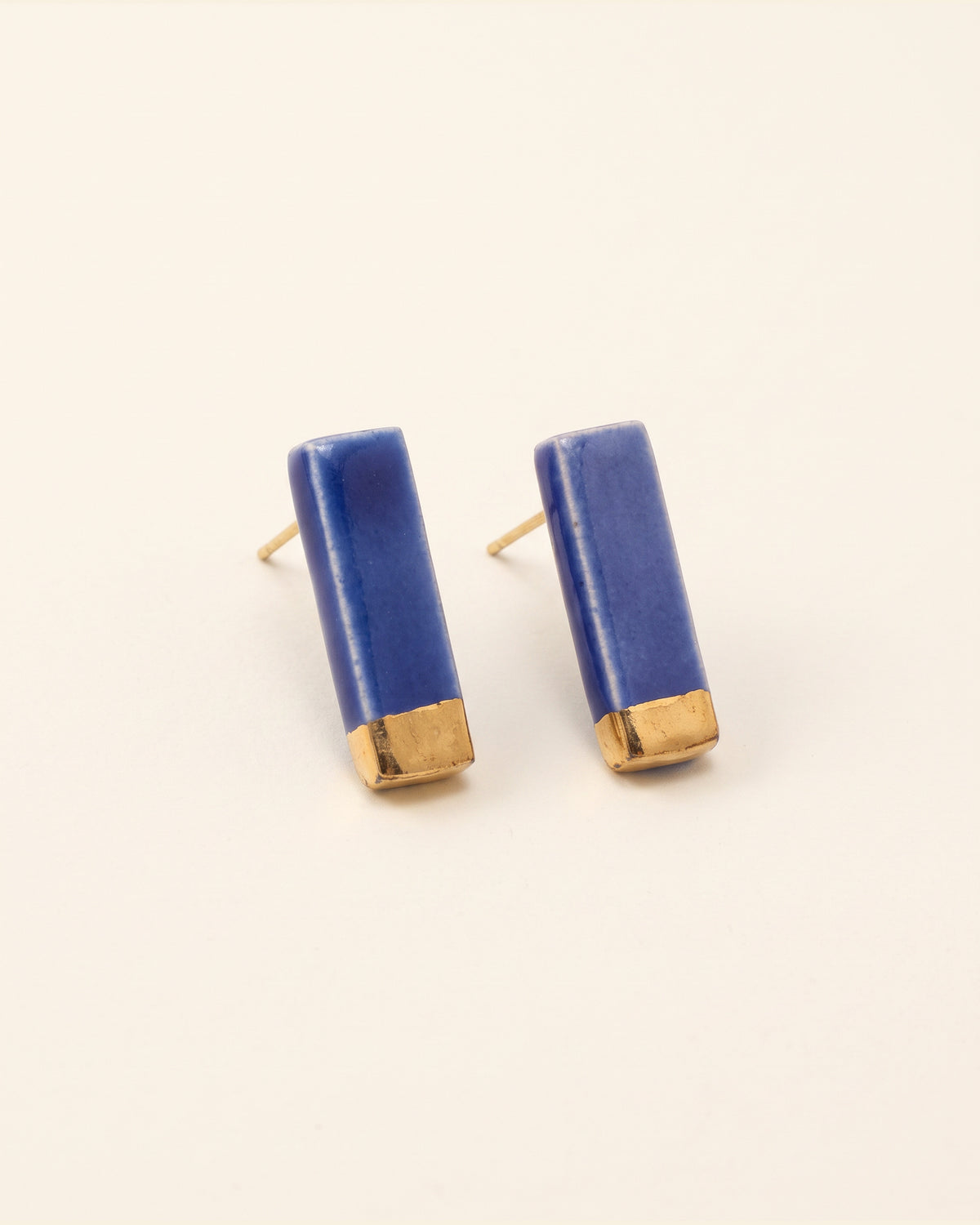 Handmade gold plated ceramic earrings, blue, gold — packshot