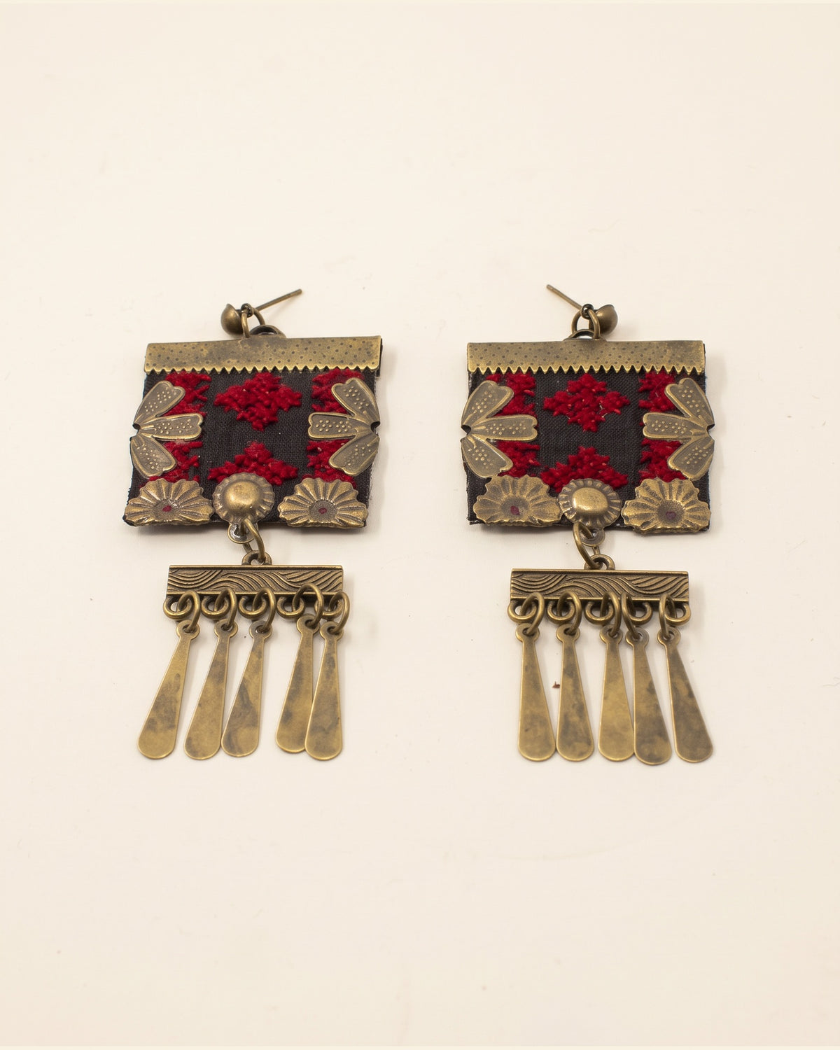 Handmade Balochi embroidered earrings, gold, red — packshot