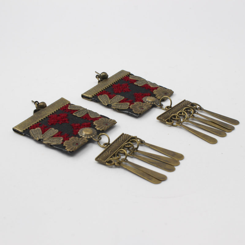 Handmade Balochi embroidered earrings, gold, red — detail