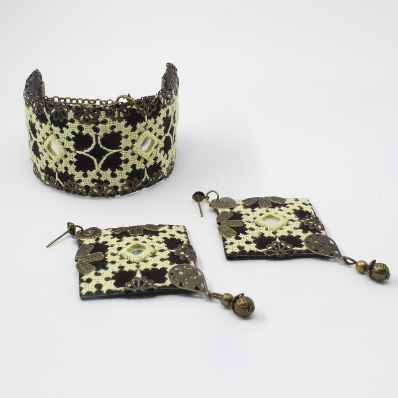 Handmade Balochi embroidered earrings and bracelet, cream, gold — detail